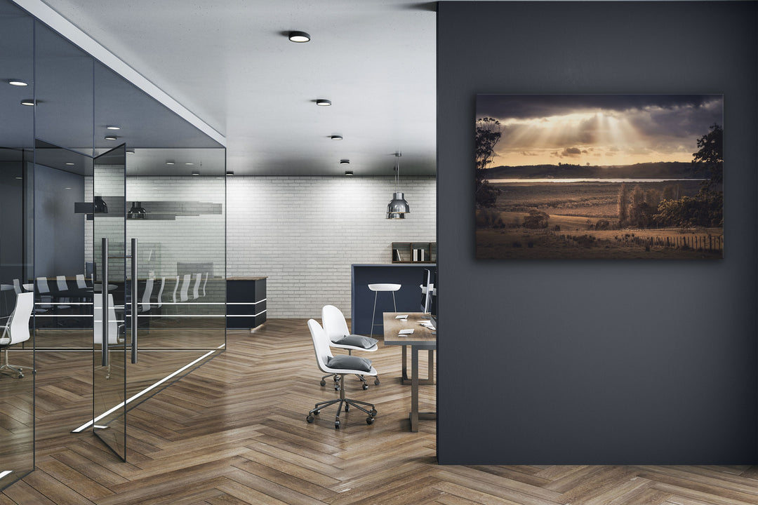 Canvas photo of New Zealand landscape on the wall of an office with desks and chairs