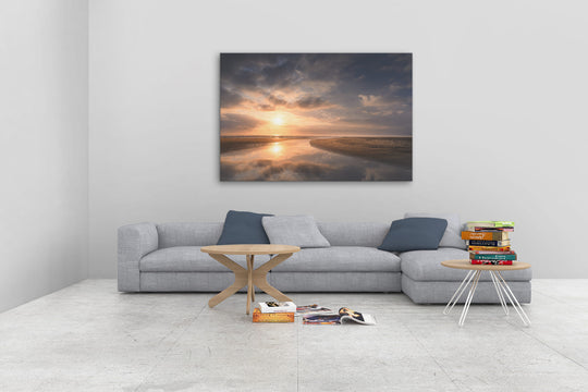 New Zealand landscape photo canvas wall art in neutral lounge setting with a grey couch, coffee tables and books