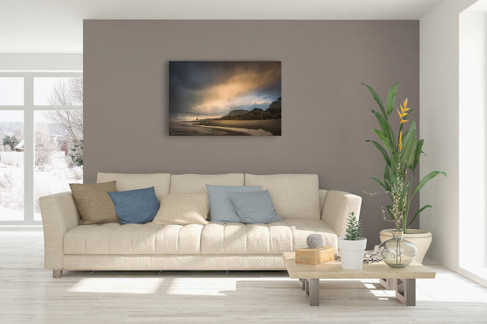 Contemporary lounge and leather couch with New Zealand landscape photo print on the wall