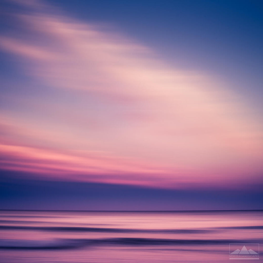 Pink and blue abstract photograph of Waikuku beach in Canterbury at sunset