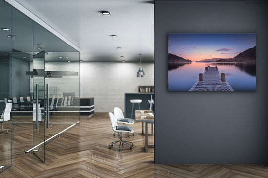 Canvas photo of New Zealand landscape on the dark grey wall of an office with desks and chairs