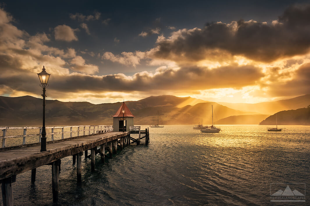 Sunbeams by the Akaroa Jetty - Newzealandscapes photo canvas prints New Zealand
