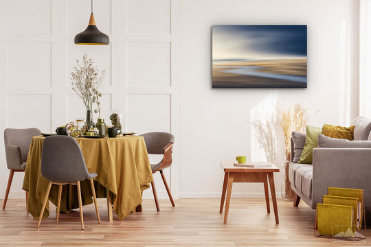  New Zealand landscape on canvas on a wall in a dining room with dining table & chairs, couch, coffee table & plants