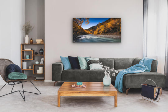 Arrowtown river photo on canvas, displayed on an interior house wall.