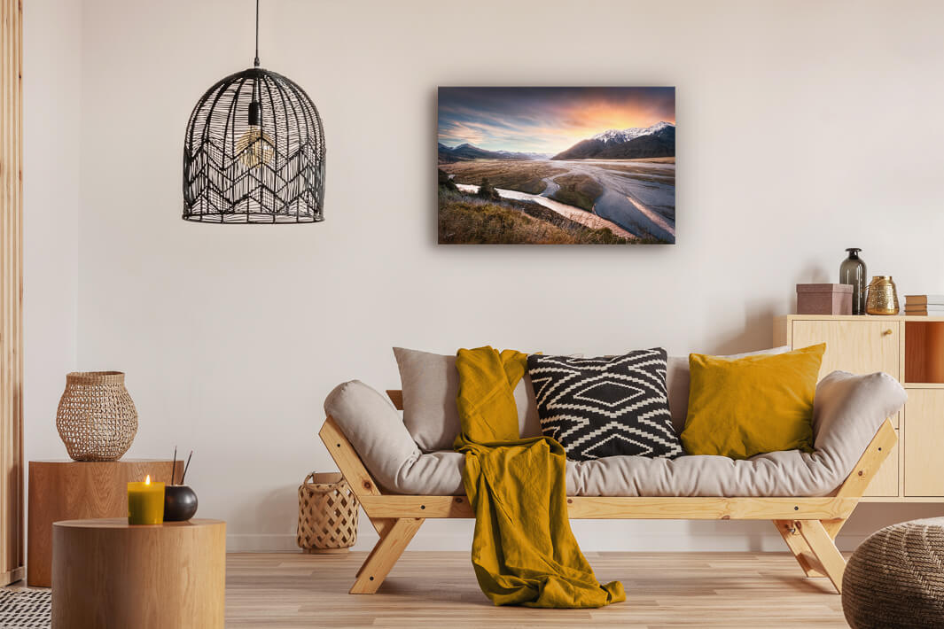 Photo print of the landscape at Arthurs Pass on a lounge wall.