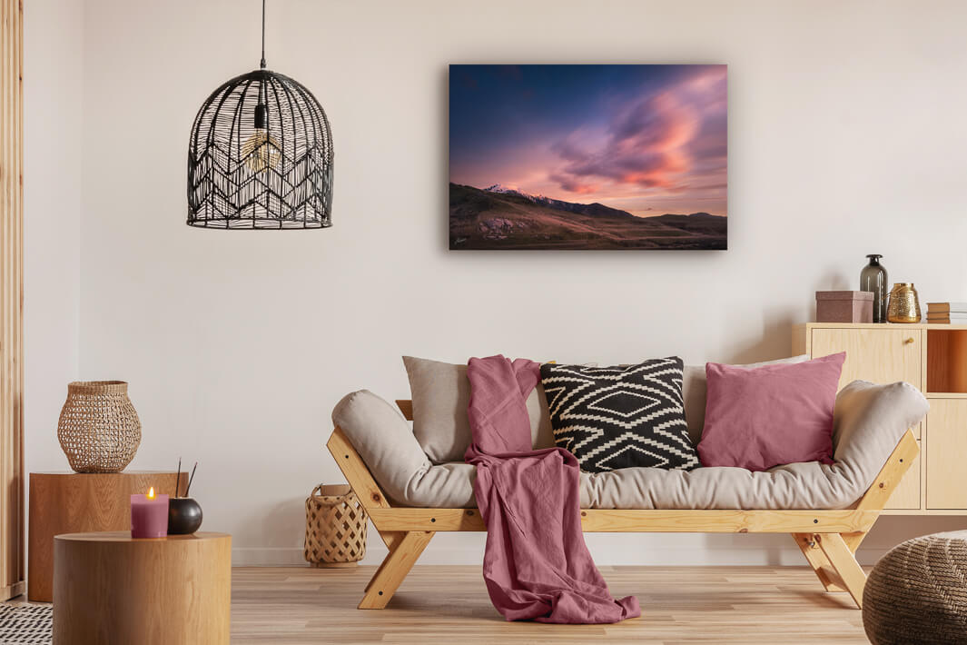 Canvas or print wall art depicted on a modern lounge wall of New Zealand scenery