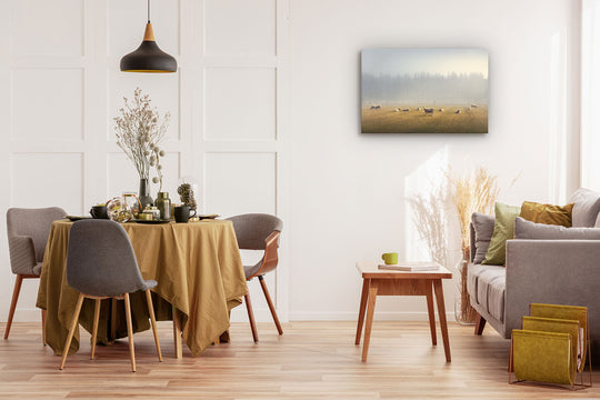 Canvas or photo wall art of sheep in a field on a dining room wall