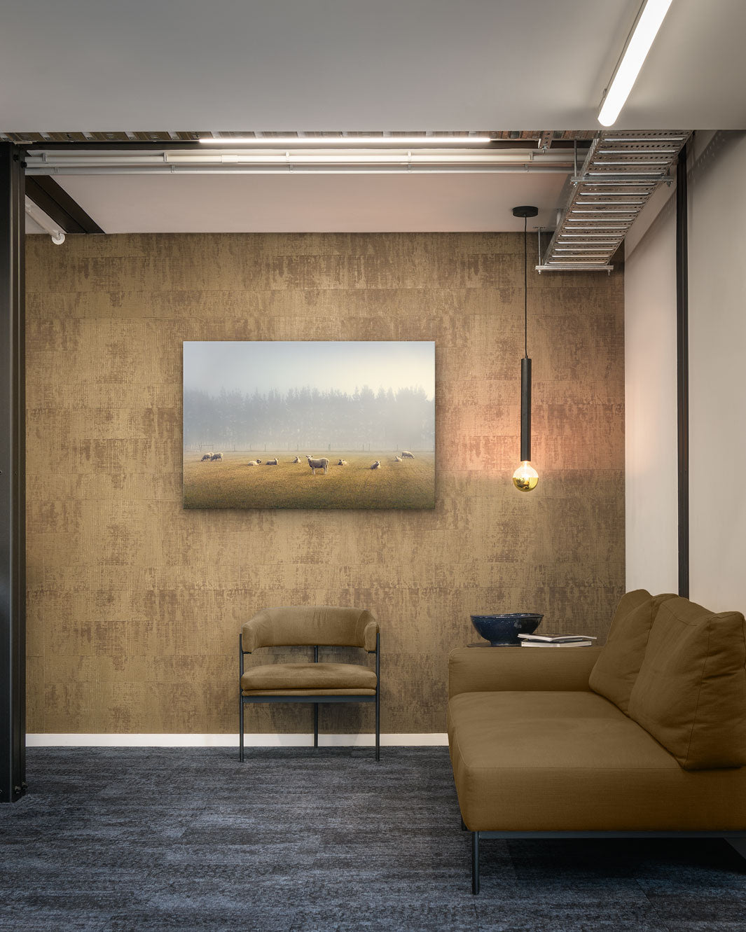 Canvas or photo wall art of sheep in a field on an office wall