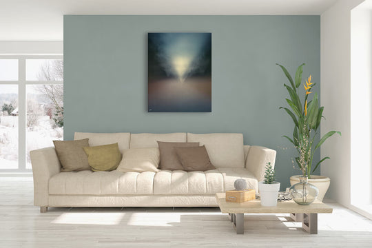 New Zealand landscape canvas photo wall art in lounge setting with a pale blue wall, white couch, coffee table, plant, cushions