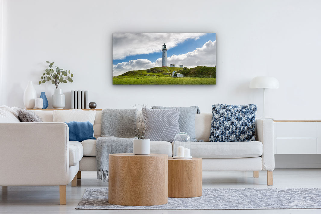 Panoramic canvas wall art of Cape Egmont lighthouse on a modern lounge living room wall