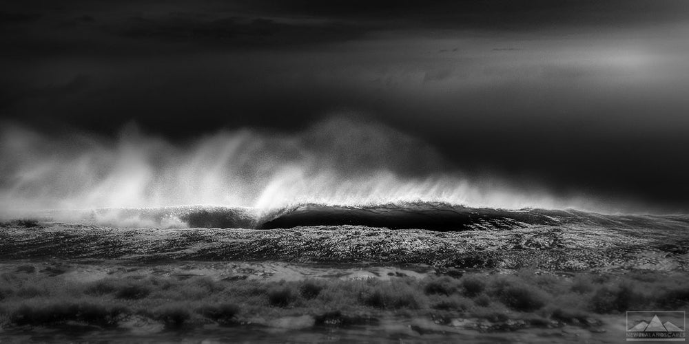 Fine art abstract black and white photo of crashing waves at the beach