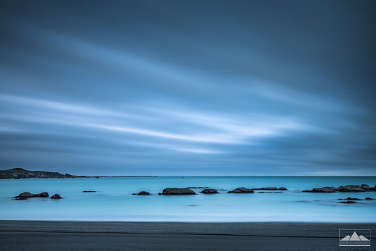 Long exposure fine art photograph of rocks in the sea at Kaikoura